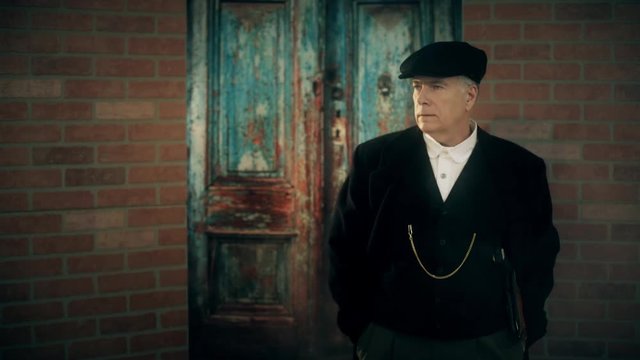 gangster from 1920s standing outside a building 4k