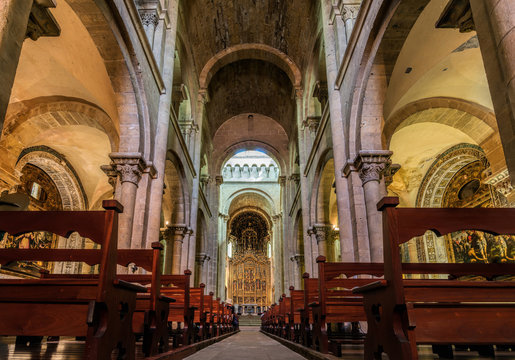 Interior of the Old Cathedral of Coimbra, a.k.a. Se Velha, a Romanesque Roman Catholic building, started in 12th century. Coimbra, Portugal.