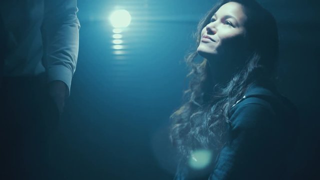  Woman in police custody being interrogated by aggressive cop