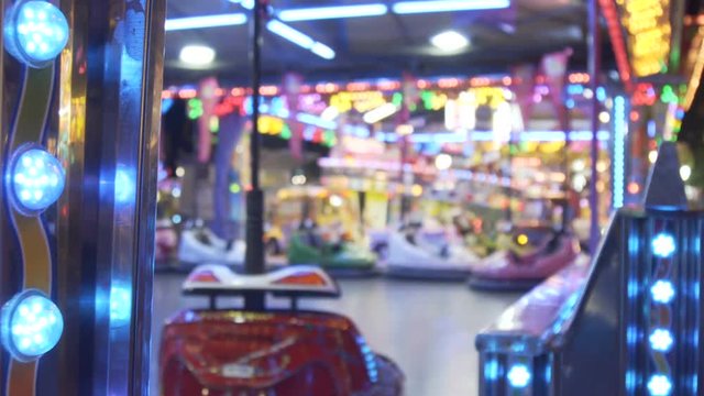 Electric bumper cars or dodgem cars at amusement park