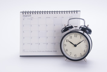 alarm clock with calendar. alarm clock with calendar on the background.