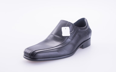shoe or men's shoes with price tag on a background.