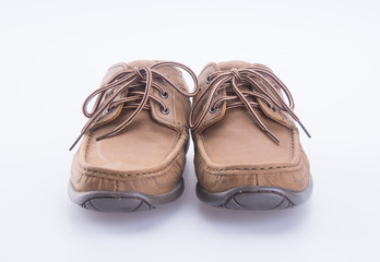 shoe or male brown leather shoes on a background.
