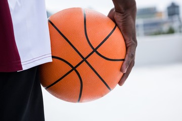 Player holding basketball