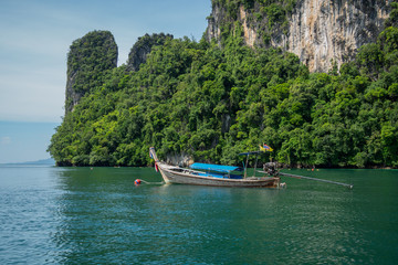 Obraz na płótnie Canvas Krabi, Thailand - October 21, 2017 : The long tail boat for send the tourists in Krabi island, Thailand.