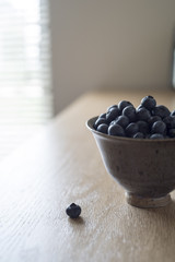 Blueberries on a Counter in a Cup