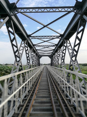 Fototapeta premium Railway metal bridge perspective view in Yulin Taiwan
