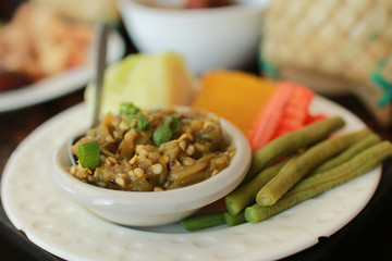 Thailand traditional favorite food or NAM PRIK NUM (NORTHERN THAI GREEN CHILLI DIP). selective focus and with a very shallow depth of field