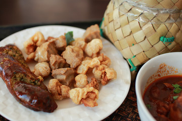 Thailand traditional favorite food or SAI AUA (NOTRHERN THAI SPICY SAUSAGE). selective focus and with a very shallow depth of field