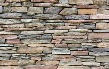 Pattern of decorative stone wall surface for background.