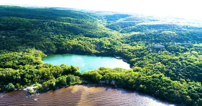 Lake surrounded by forest with air