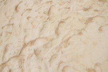 Sand footprint on beach background 