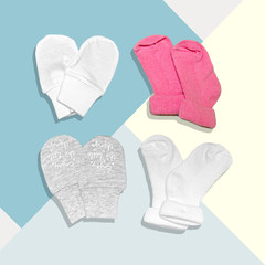 Baby clothes on colorful background