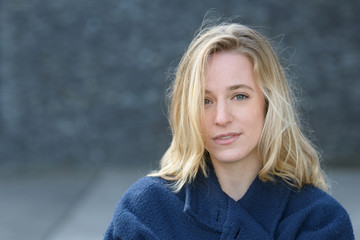 Attractive thoughtful young woman in fall