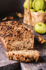 Homemade oatmeal apple cake crumbs on top on vintage rustic wooden background. Flourless, healthy dessert. Thanksgiving Day's treat dessert. Selective focus 