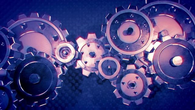 The gear mechanism. Gears of different diameters interact and drive the mechanism.
