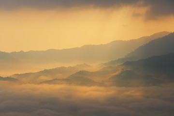 Sunshine and clouds on the morning mist At Phu Lang Ka, Phayao, Thailand