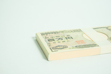 Fototapeta premium 日本円 １００万円の札束イメージ（１００万円のメモ帳 シンプル素材）白背景