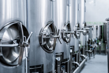 Large steel tanks, Shop location.