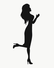 Silhouette of a young woman in motion