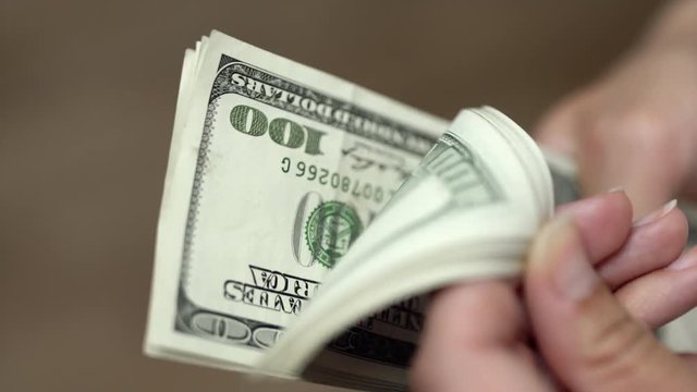 Considers dollars. Business and financial concept 4k