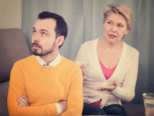 Mature mother and son quarrel