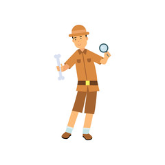 Archaeologist studying bone through magnifying glass