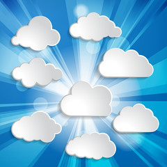 Bright blue abstract festive bokeh sun effect with clouds backgr