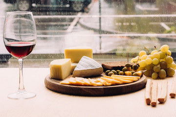 glass of red wine and cheese