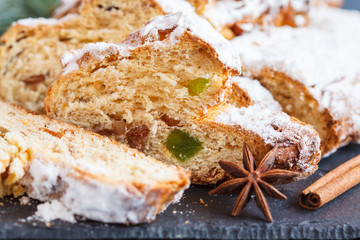 Christmas stollen, dark background, macro