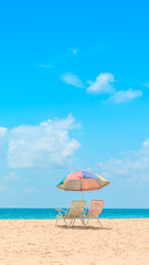 Ka-ron Beach at Phuket , Thailand. White sand beach with beach umbrella. Summer, Travel, Vacation and Holiday concept.