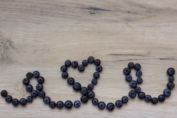Blueberries on wooden background