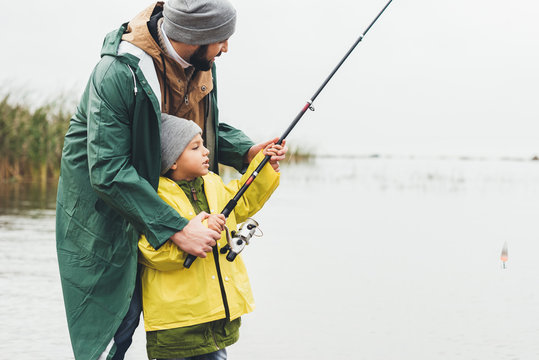 Father And Son Fishing Together