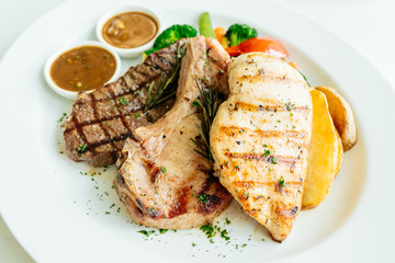 Chicken breast and Pork chop with beef meat steak and vegetable
