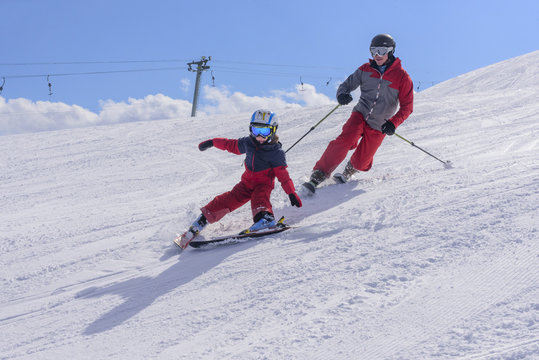 mit Papa beim Skifahren