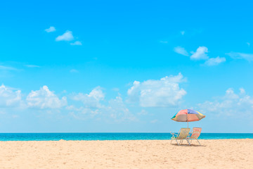 Ka-ron Beach at Phuket , Thailand. White sand beach with beach umbrella. Summer, Travel, Vacation and Holiday concept.