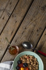 Fruit cereal in jar with napkin cloth