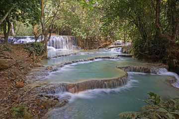 The lower cascades of Kuang Si Waterfall in Laos. 