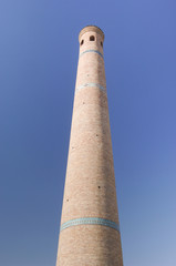 High oval tower of bricks quite ancient Asian buildings. the details of the architecture of medieval Central Asia