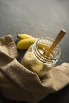 Fruit cereal in jar with napkin cloth