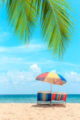 Ka-ron Beach at Phuket , Thailand. White sand beach with beach umbrella. Summer, Travel, Vacation and Holiday concept.