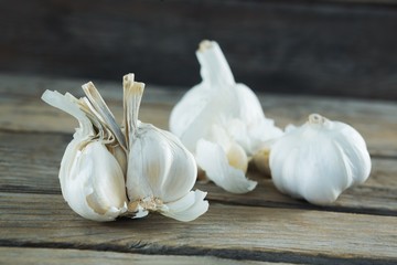 Garlics on wooden table