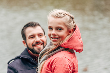 Fototapeta premium happy father and daughter in park