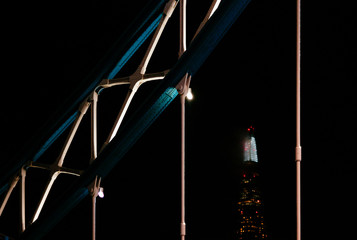 The Shard building framed by Tower Bridge. London, England.