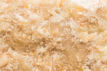 Lightened slices marble onyx. Horizontal image. Warm calm colors. Beautiful close up background, onyx marble texture.