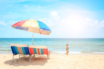 Ka-ron Beach at Phuket , Thailand. White sand beach with beach umbrella. Summer, Travel, Vacation and Holiday concept.