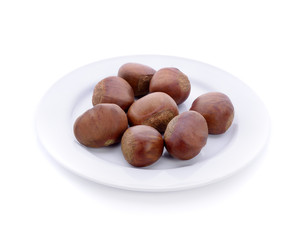 chestnuts  in white plate isolated on white background