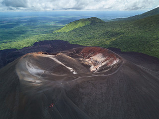 People on volcano sliding tour