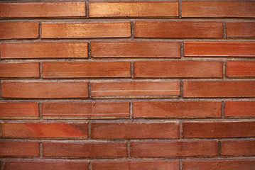 Pattern of long red bricks wall background