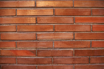 Pattern of long red bricks wall background